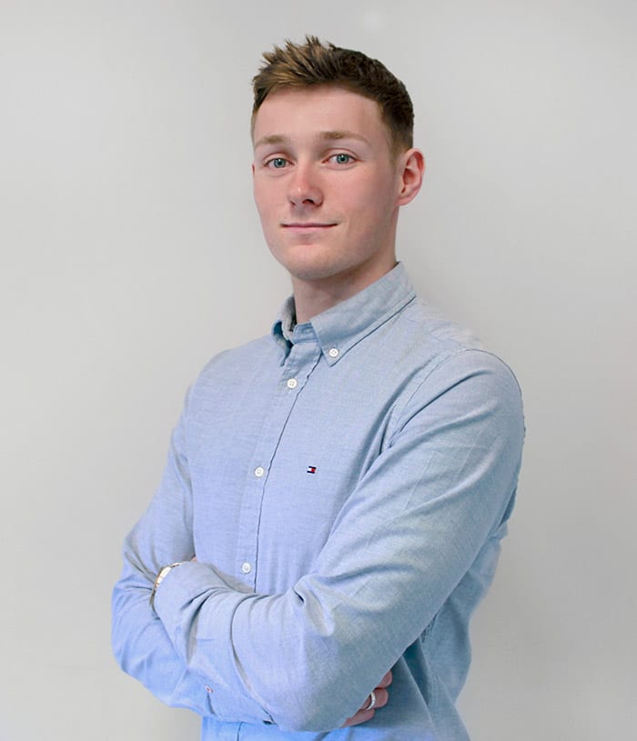 Jamie Man in blue shirt with arms crossed